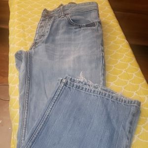 29x30 - vintage aesthetic rips at end of cuffs - faded light blue look -